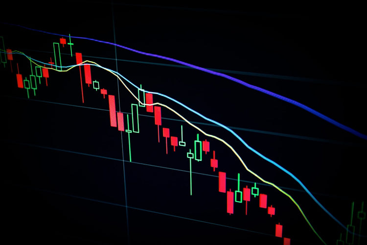 Forex trading charts and currency symbols on a screen